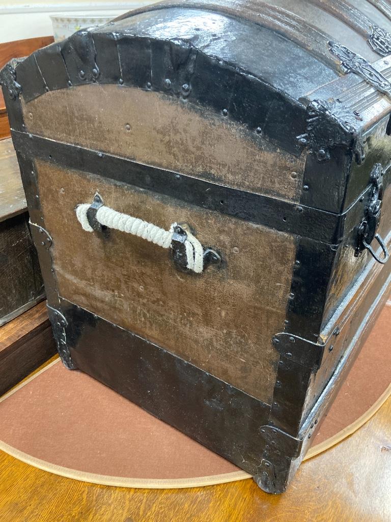 A Victorian iron mounted domed top trunk with street iron mounts, length 81cm, depth 49cm, height 60cm